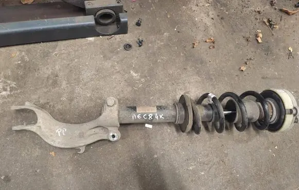 Front shock absorber with coil spring