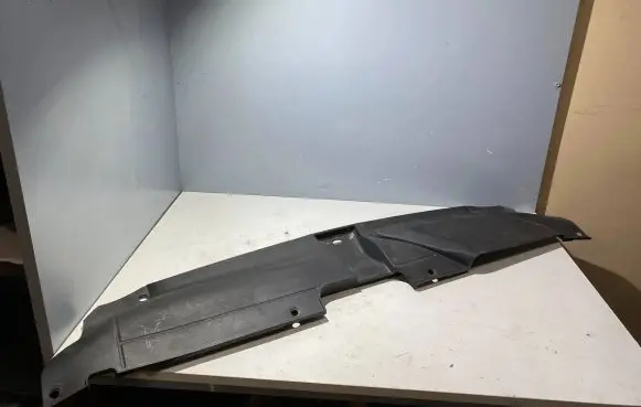 Engine bonnet/hood lock trim molding