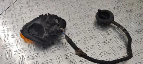 Tail light bulb cover holder