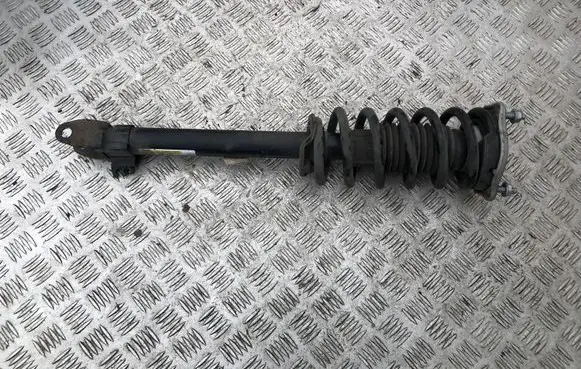Front shock absorber with coil spring