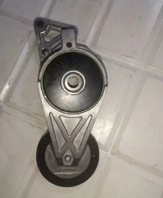 Generator/alternator belt tensioner