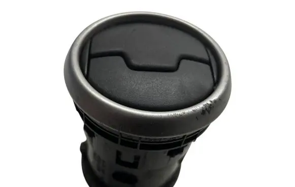 Dash center air vent grill
