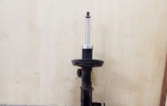 Opel Zafira C Front shock absorber/damper 13419912