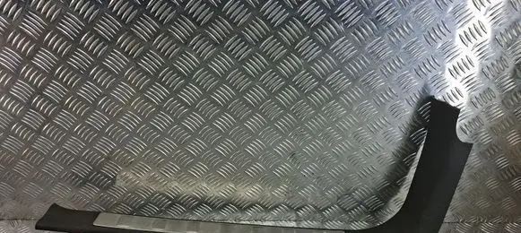 Front sill trim cover