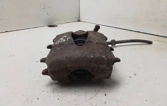 Volkswagen Golf IV Front brake caliper