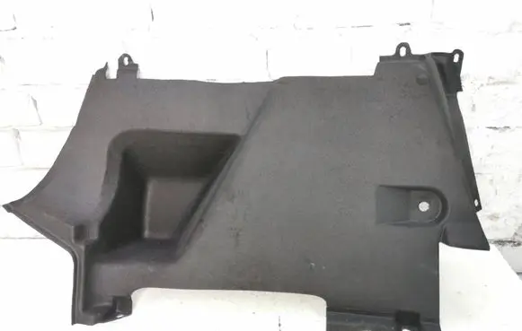 Trunk/boot lower side trim panel