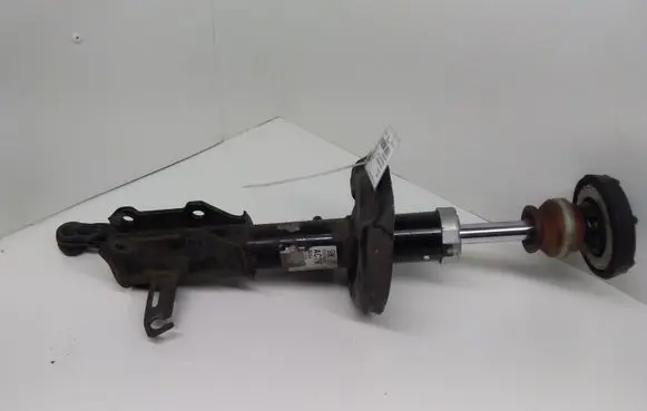 Opel Astra J Front shock absorber/damper 13474020