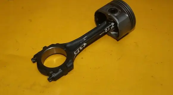 Piston with connecting rod