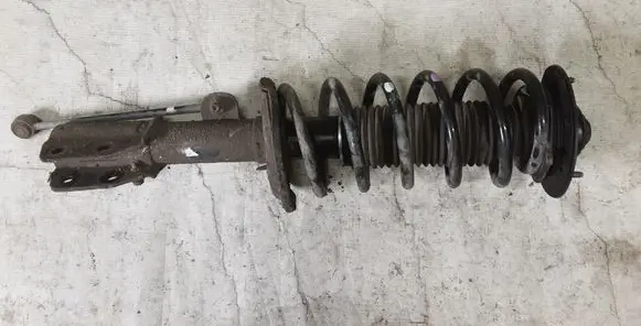 Front shock absorber with coil spring