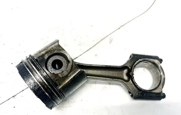 Piston with connecting rod