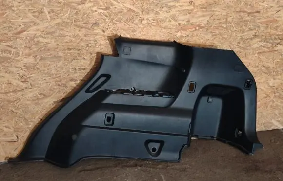 Trunk/boot lower side trim panel