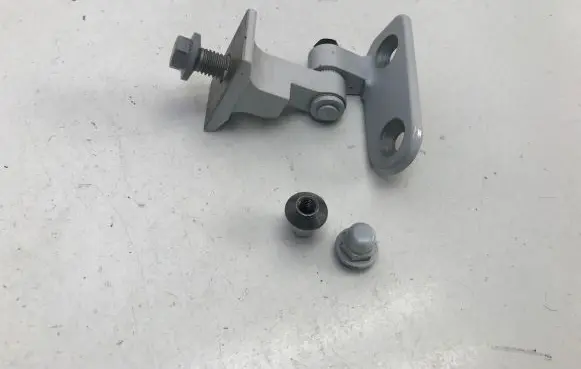 Front door lower hinge