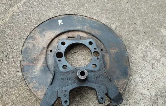 Jeep Grand Cherokee (WJ) Rear brake disc plate dust cover 