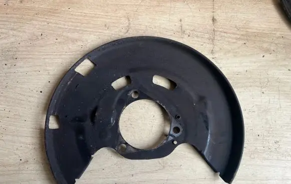 Opel Astra J Front brake disc dust cover plate 