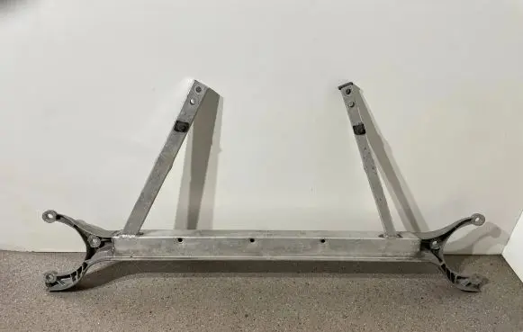 Top upper radiator support slam panel
