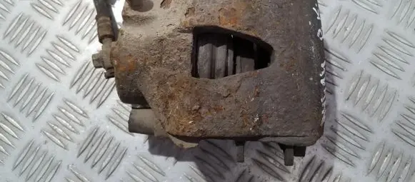 Volkswagen Golf IV Front brake caliper