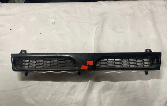 Nissan Sunny Front bumper upper radiator grill