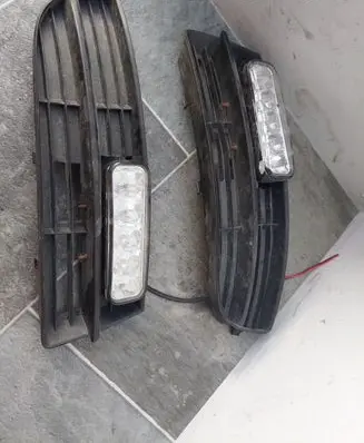 Volkswagen Touran I Front bumper lower grill 1T0853666 1T0853665