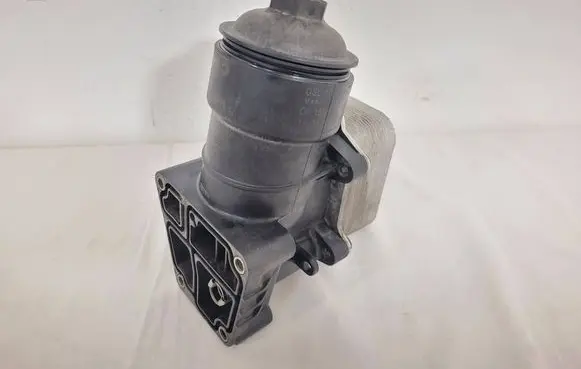 Volkswagen Golf VI Oil filter mounting bracket 03L117021C