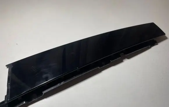Front door glass trim molding