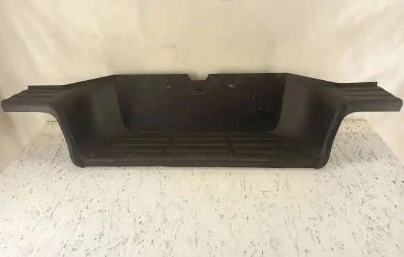 Rear bumper trim bar molding