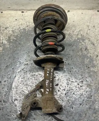 Nissan Primera Front shock absorber with coil spring