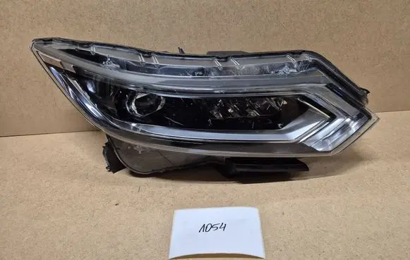 Nissan Qashqai Headlight/headlamp 10019011