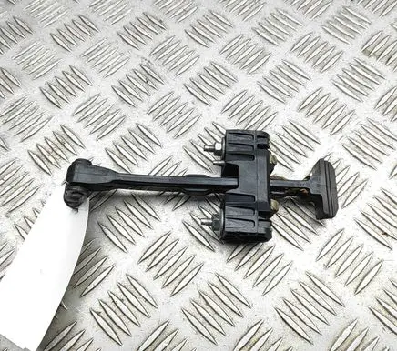 Front door check strap stopper