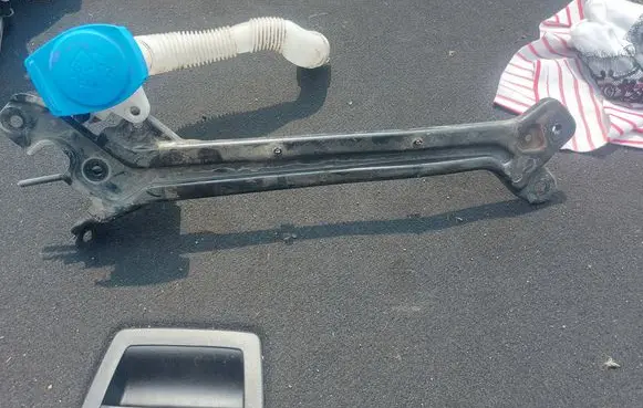 Engine bonnet/hood lock trim molding