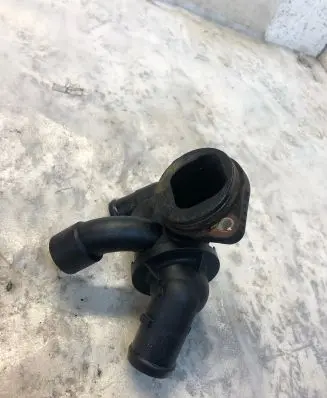 Thermostat/thermostat housing