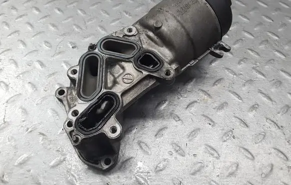 Citroen C4 I Oil filter mounting bracket 9656969980