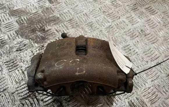 Volkswagen PASSAT B7 Front brake caliper