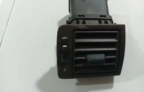 Dash center air vent grill