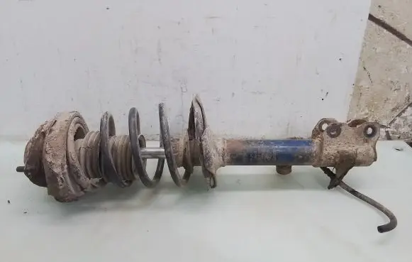 Nissan X-Trail T30 Rear shock absorber with coil spring 