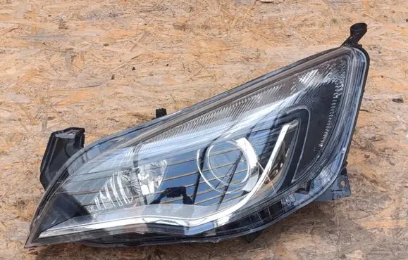 Opel Astra J Headlight/headlamp 13253650 1ZT01001201
