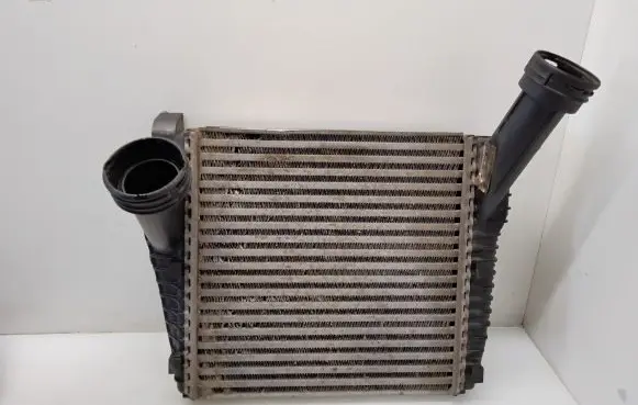 Volkswagen Touareg I Intercooler radiator 7L6145804 E3705003
