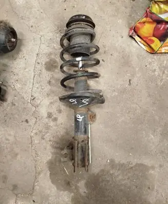 Suzuki Forenza Front shock absorber with coil spring 339030 KE4102