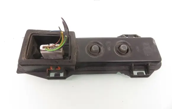 Tail light bulb cover holder