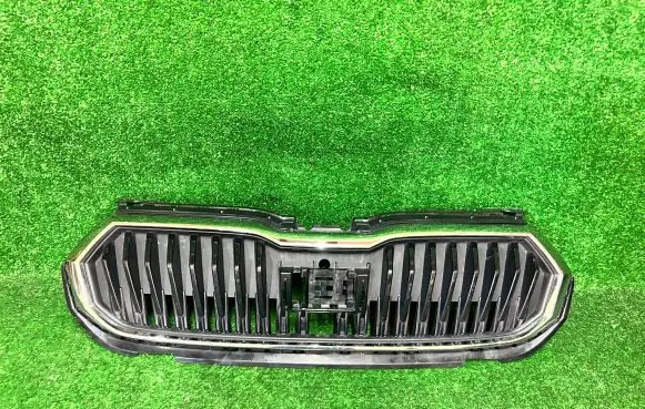 Skoda Fabia Mk4 (6VA) Front bumper upper radiator grill 6VA853653A