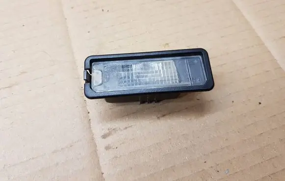 Volkswagen Eos Number plate light 1K8943021