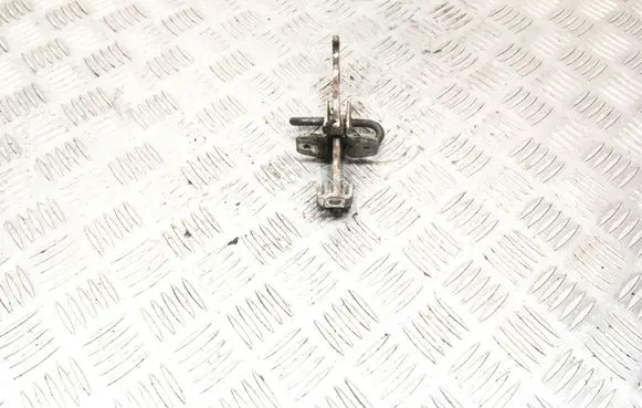 Front door check strap stopper
