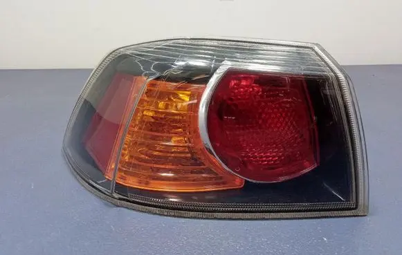 Mitsubishi Lancer VIII Rear/tail lights P5613