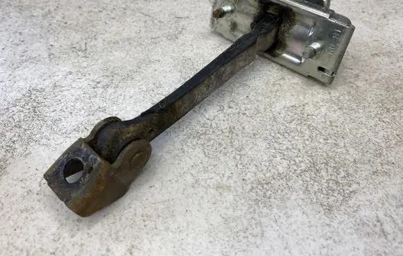 Opel Corsa D Rear door check strap stopper 13181961