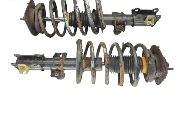 Front shock absorber with coil spring