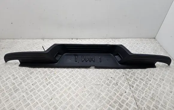 Rear bumper trim bar molding