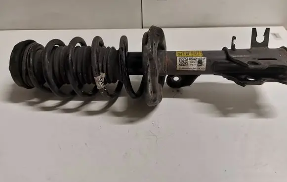 Buick Encore I Front shock absorber with coil spring 95266857 42419066
