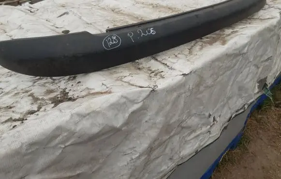Rear bumper trim bar molding