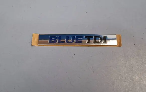 Volkswagen PASSAT B7 Manufacturers badge/model letters 3C0853675BQ