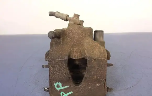 Volkswagen Golf IV Front brake caliper