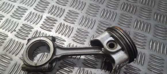 Piston with connecting rod